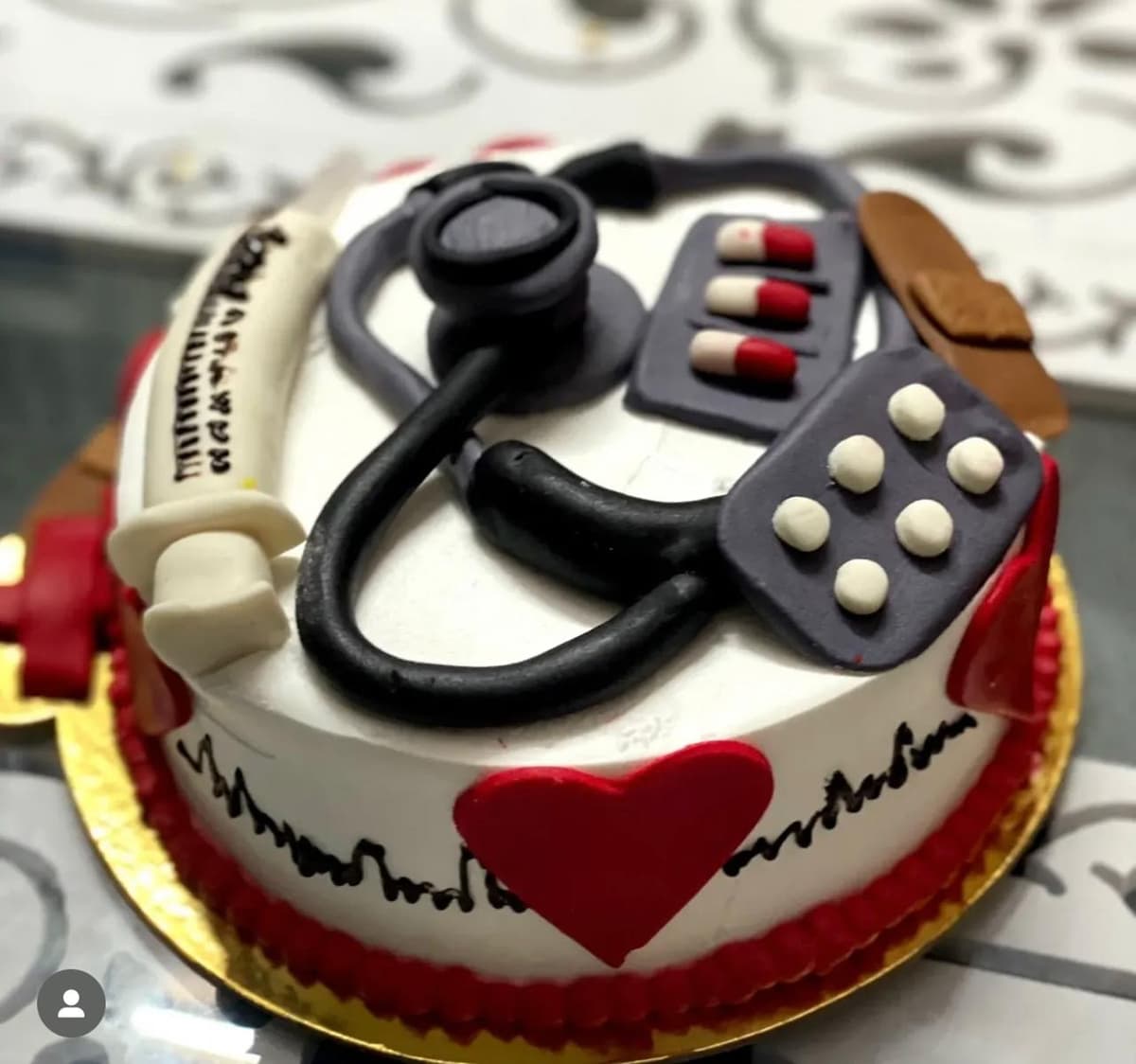 Custom doctor-themed cake with medical decorations